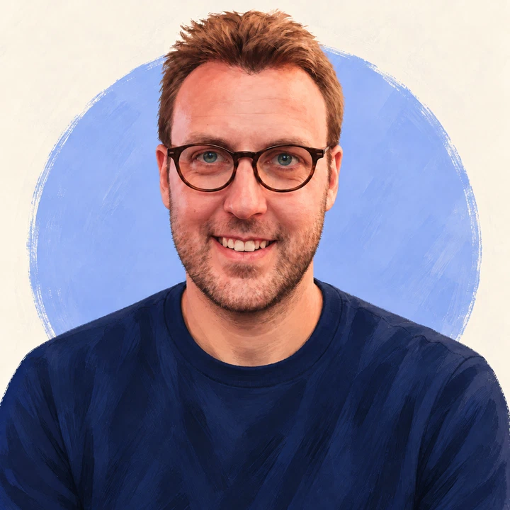 Illustrated portrait of Adrien with brown hair, a beard and round glasses.